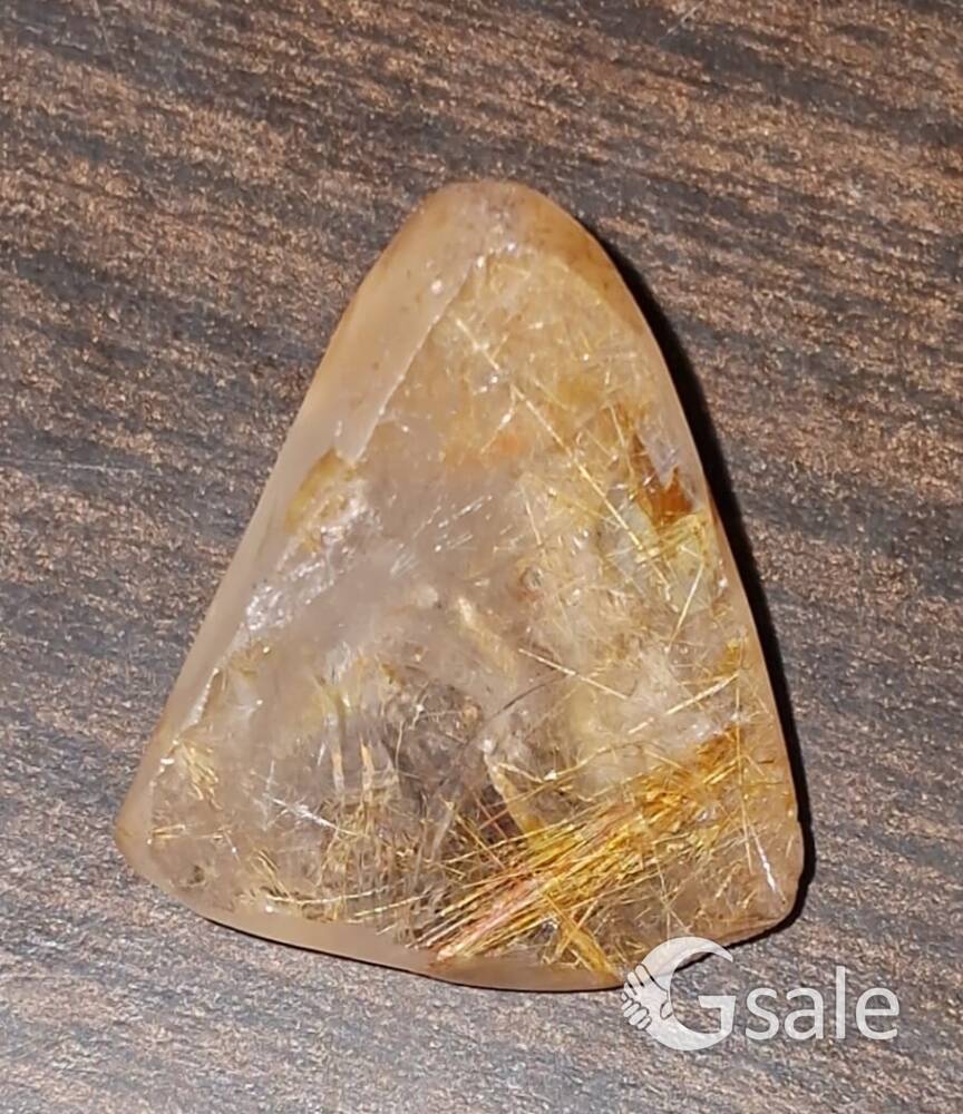 clear hairy Quartz crystal with golden and pink hairs inside