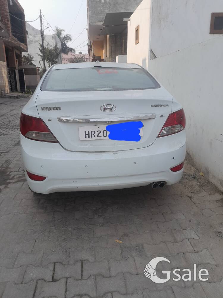 Verna 2013 , Hyundai,  white in colour,fuel petrol,second owner, 130000 km run , with new seat cover