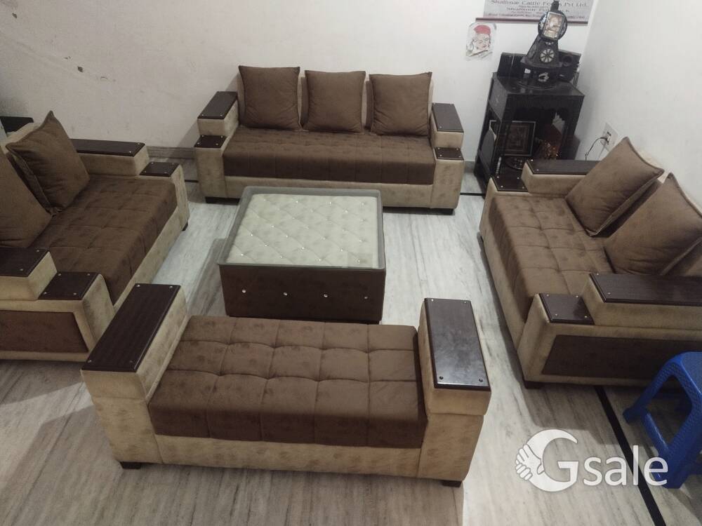 Wooden sofa with glass top 