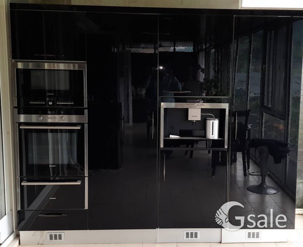 Siemens built-in kitchen with Cabinets.