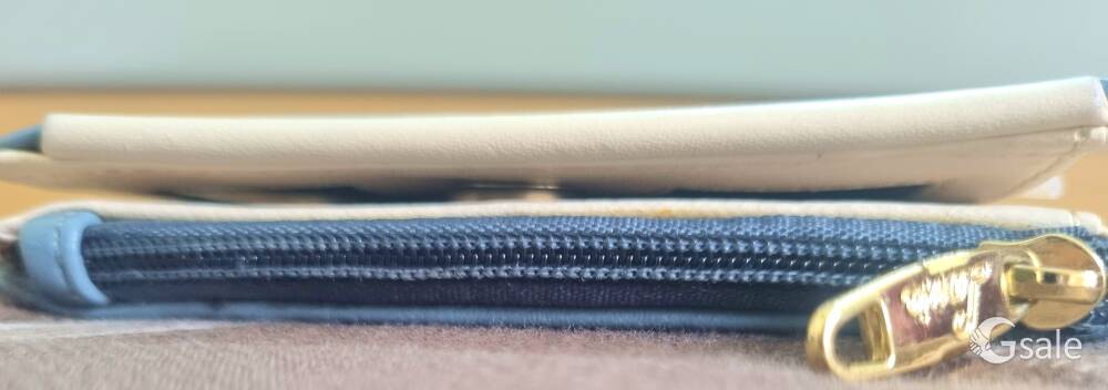Blue solid two folded wallet has a button closure
