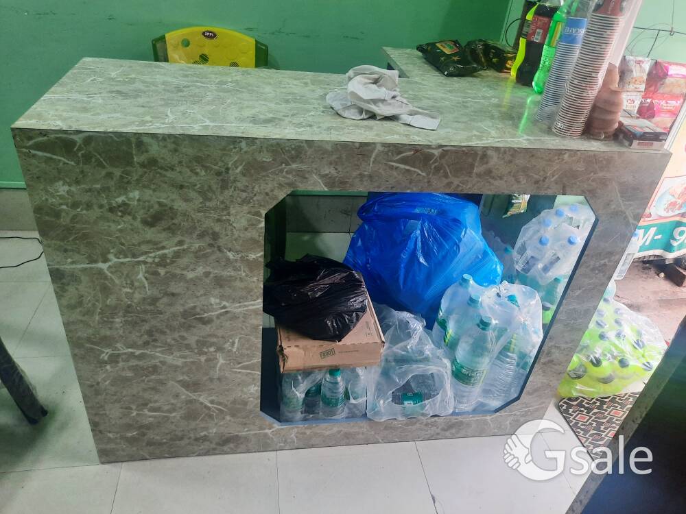 shop or office counter and two chairs