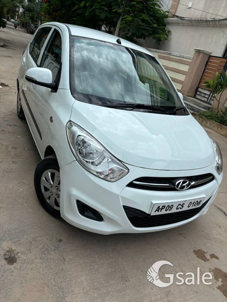 i10 in white colour in neat condition 
