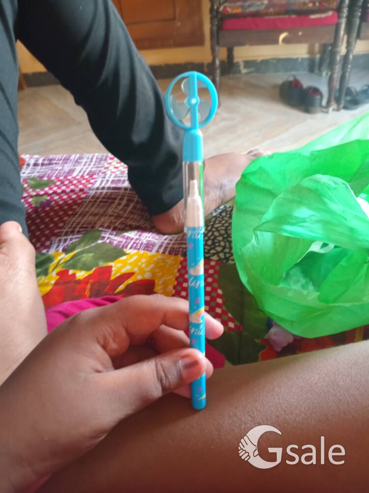 small fan with pencil 