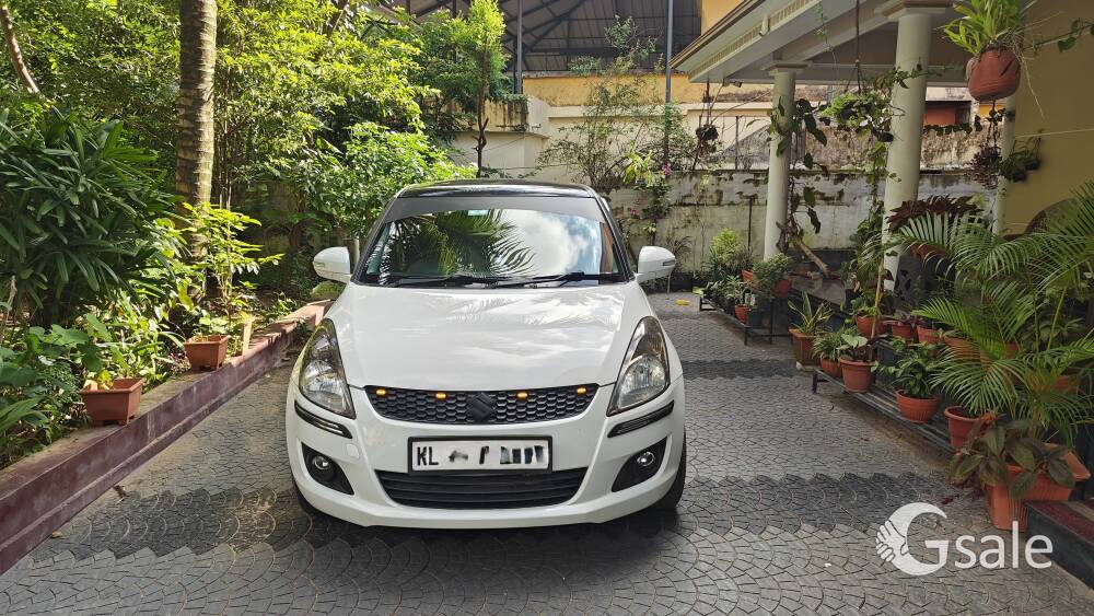 Maruti Swift VDI with alloys and reverse camera 