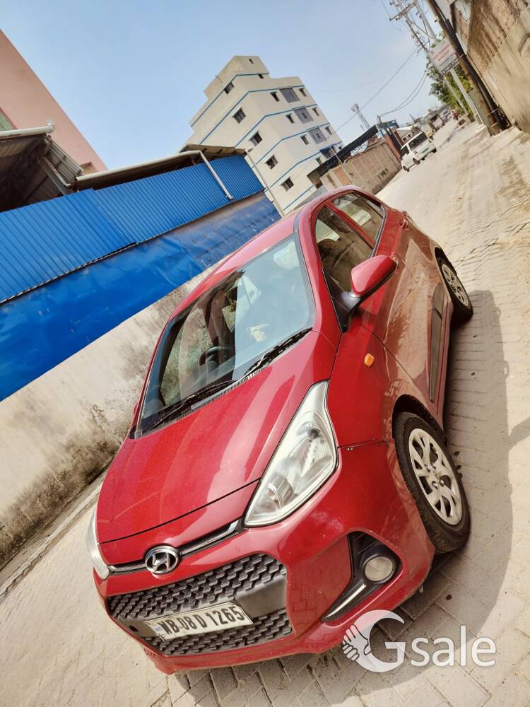grand i10 sportz red with warranty 