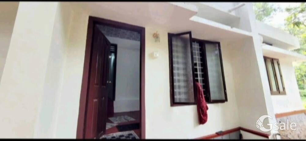 50cent land with rubber, old house, well, bore well, current, road etc