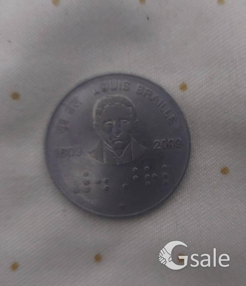 Louis Braille commutative coin