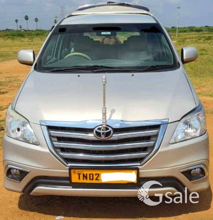 Innova gold colour car